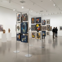 Pannello espositivo EXPO'  "griglia metallica" con basi tonde MD-EXGT2